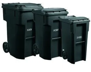 Three black plastic rolling trash bins of varying sizes, arranged from largest to smallest.